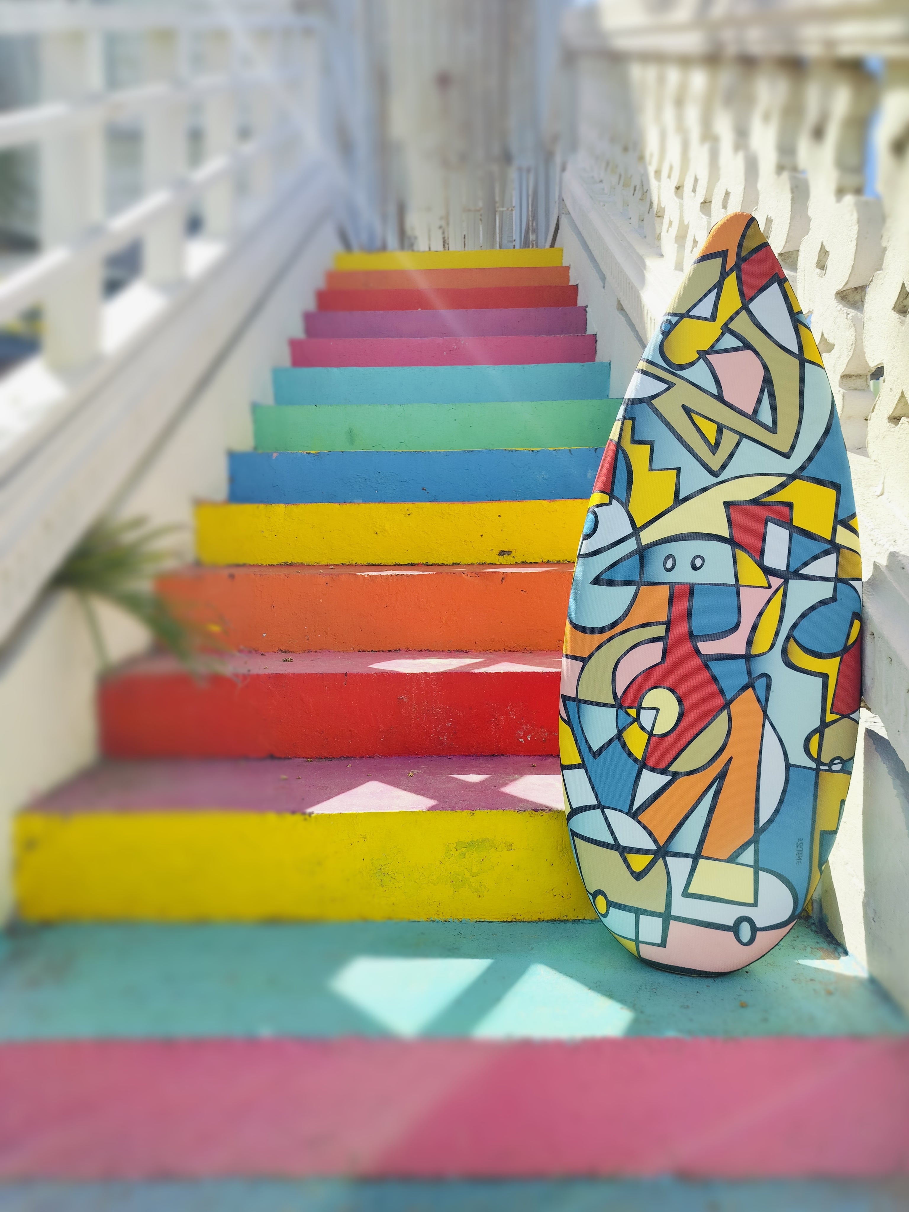 The vibrant Nils ToyBoard on a beautiful coloful staircase